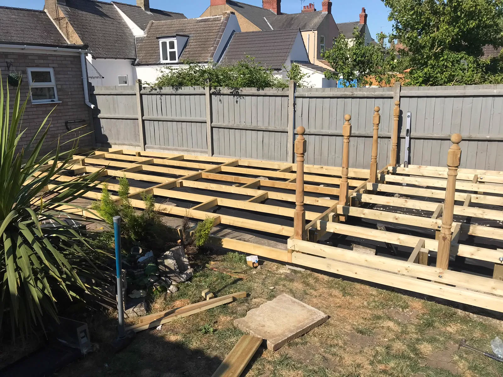 Structural timber frame being built for a raised garden deck